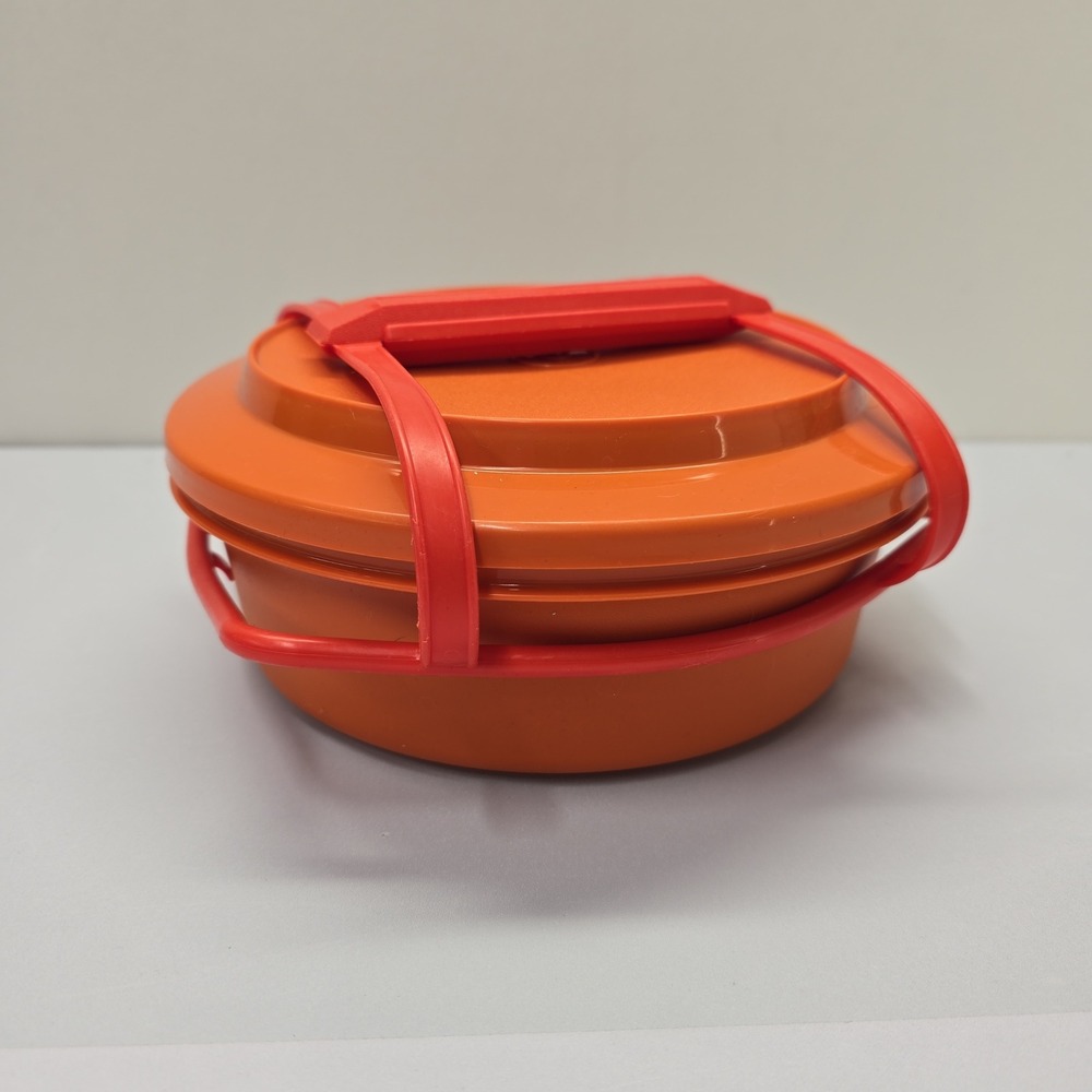 Vintage Tupperware Orange Servalier steam strain Bowl Made in USA